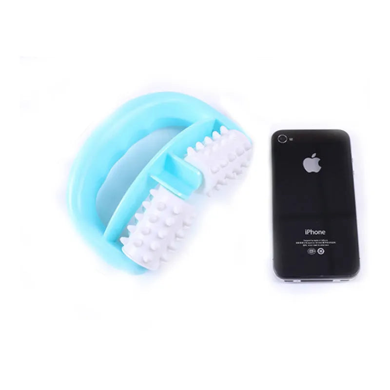 Handheld anti-cellulite massager roller with dot wheels in blue, green, and rose red colours on white background