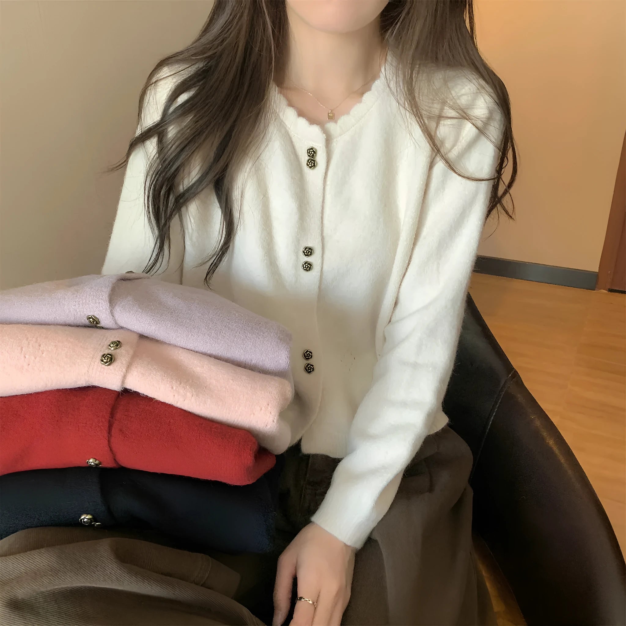 Women's long-sleeved acrylic cardigan coat in milky white, shown in a regular fit.