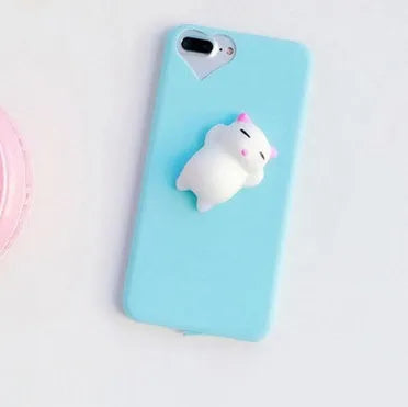 Soft pink silicone iPhone case with a 3D cartoon cat design on the back.