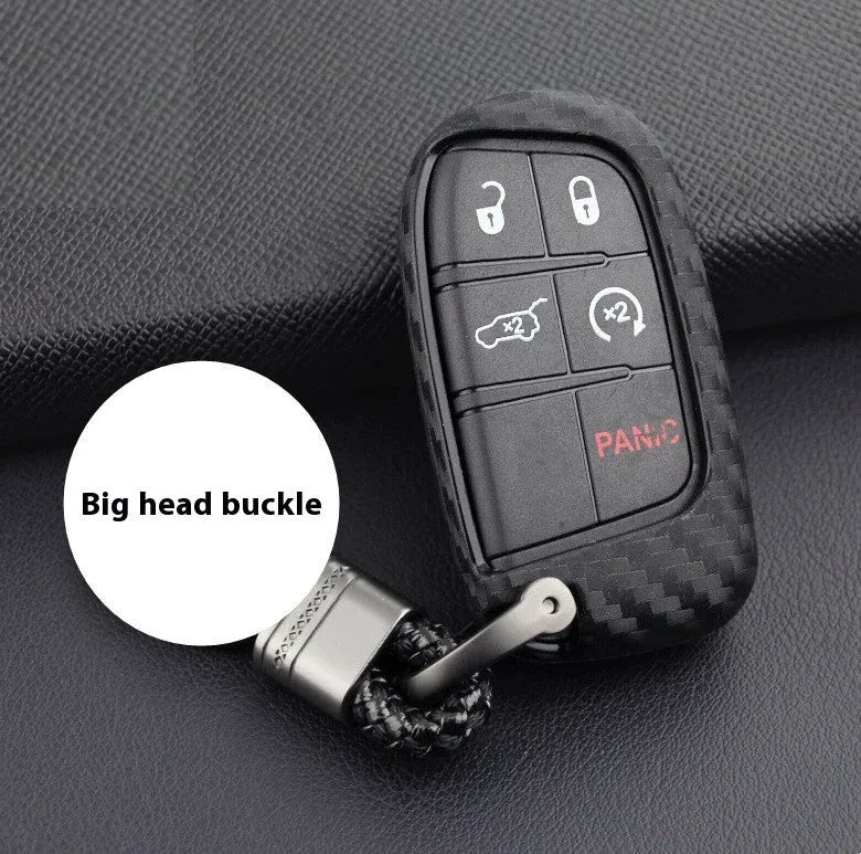 Black carbon fibre silicone key case for Dodge Chrysler Fiat car remote keys, shown in bag and buckle styles.