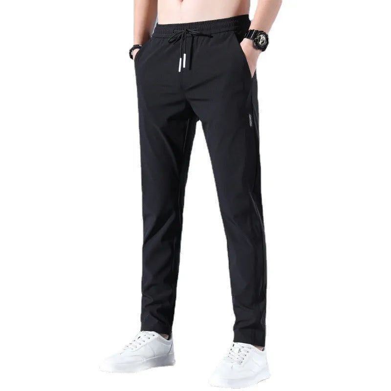 Men's summer ice silk stretch straight sports trousers in loose fit with drawstring, available in black, dark gray, light gray, light green