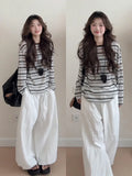 Black stripes long sleeve polyester t-shirt with relaxed fit for women