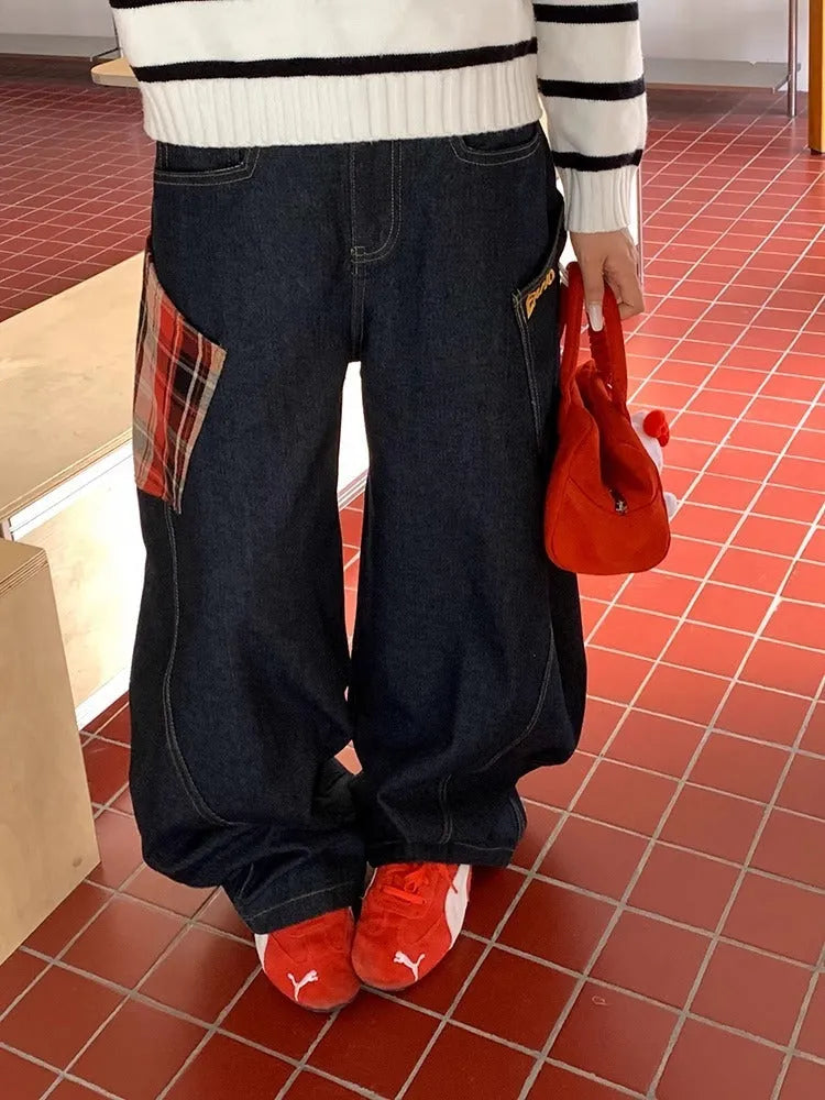 Man wearing loose-fit straight-leg plaid casual trousers in a retro style