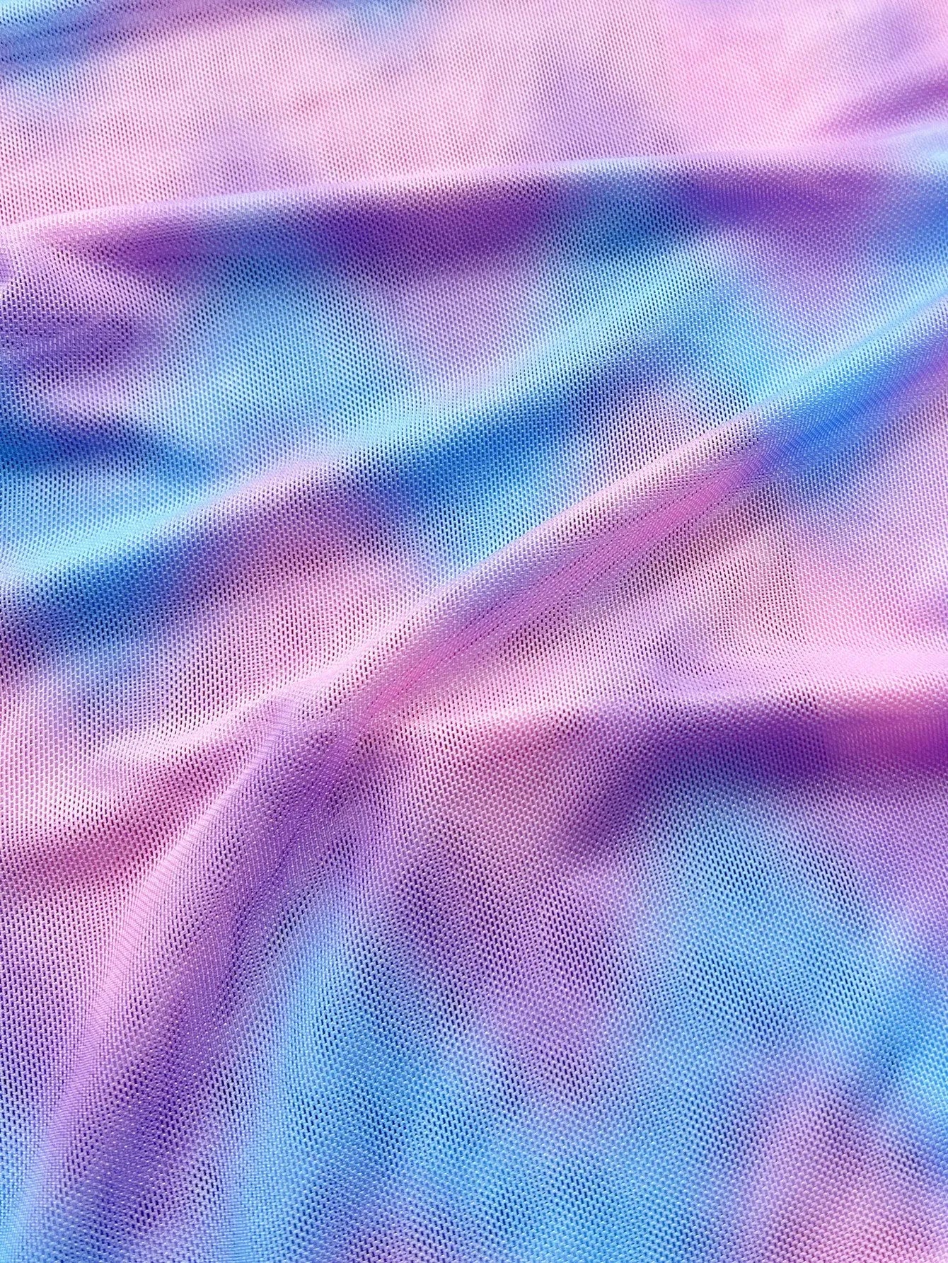 Women's tie-dye bikini swimsuit set with matching high-waisted skirt