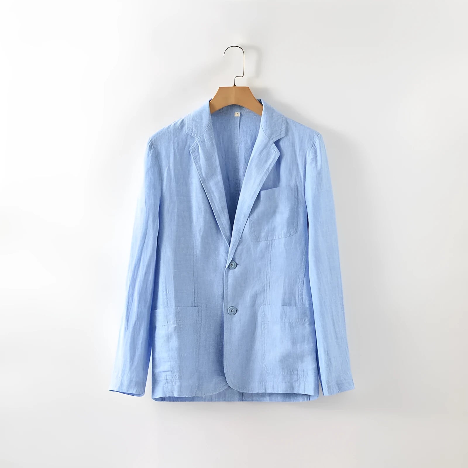 Men's solid colour linen suit coat with a stick pocket on a hanger.