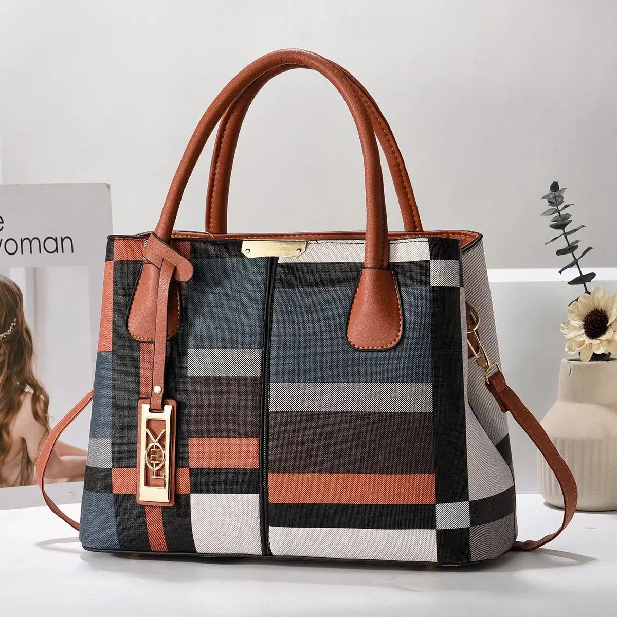 Women's large capacity shoulder bag in soft PU leather with adjustable strap and multiple colour options