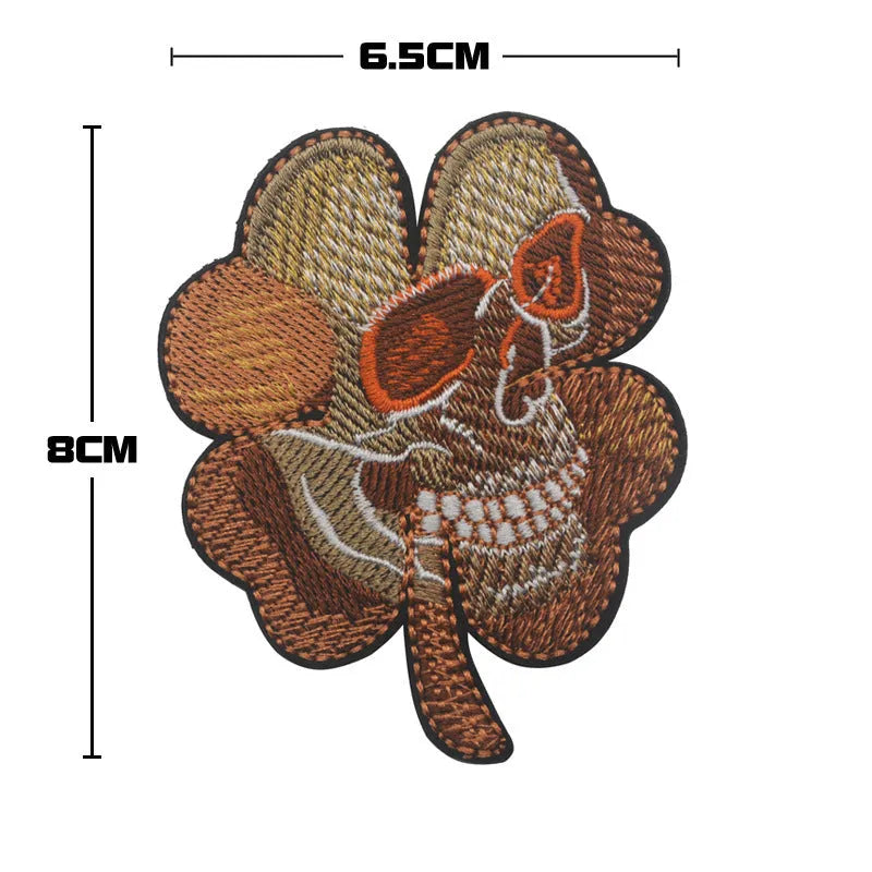 Outdoor embroidered fabric badge with velcro backing showing camouflage design
