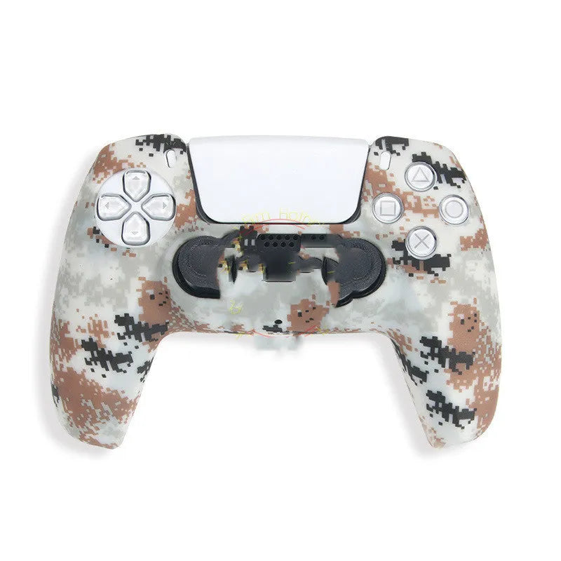 Camouflage patterned silicone grip case fitted on a black Sony PS5 DualSense controller.