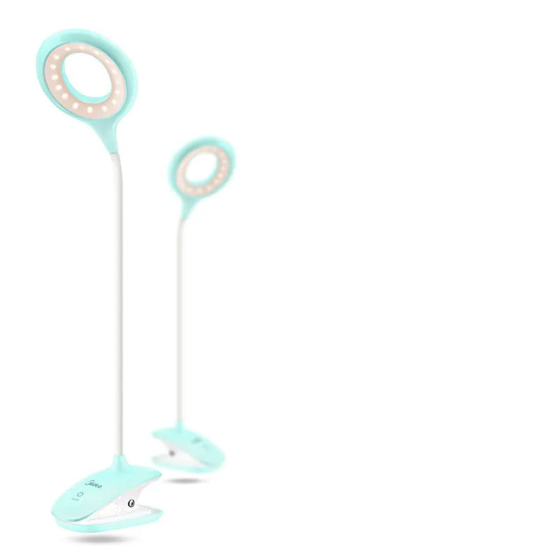 Green USB rechargeable table lamp with touch switch on a wooden desk.