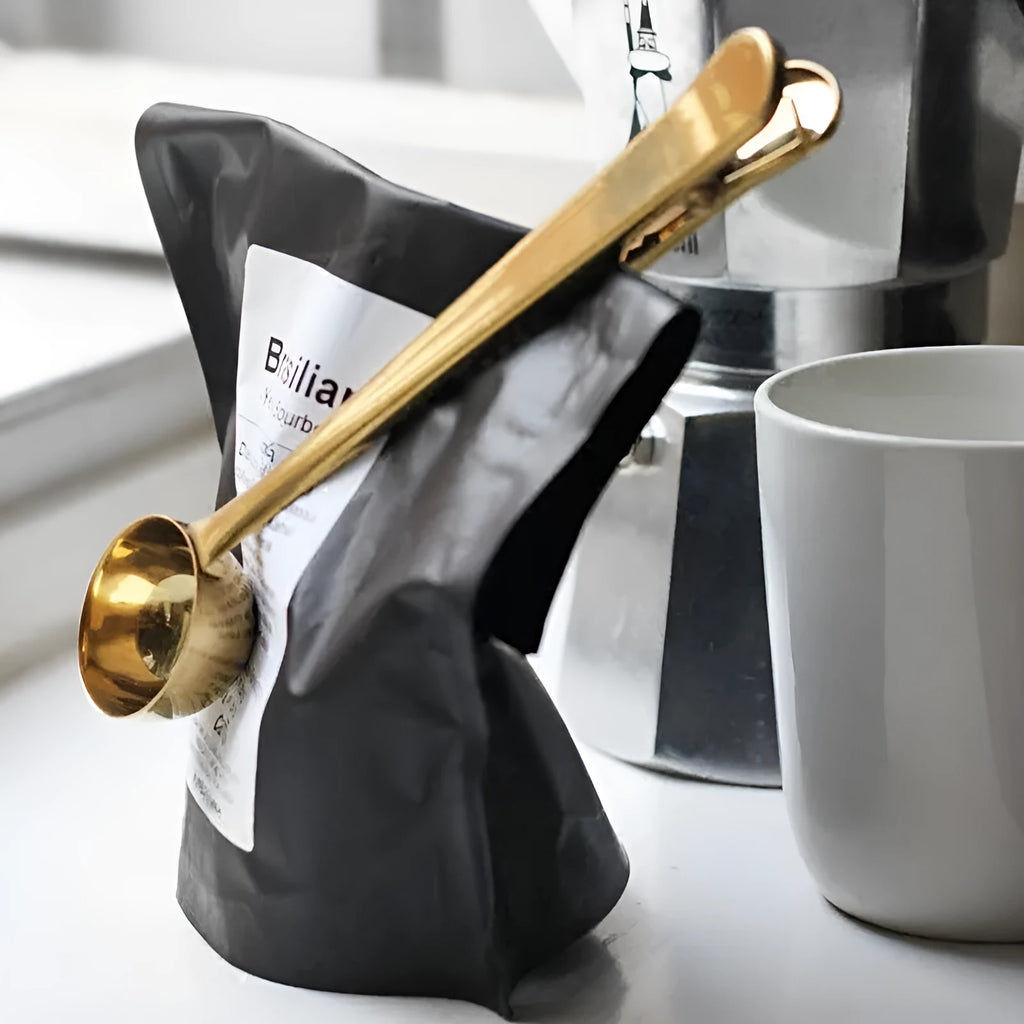 Stainless steel coffee clip spoon showing scoop and bag clip design, 17.5 cm long.