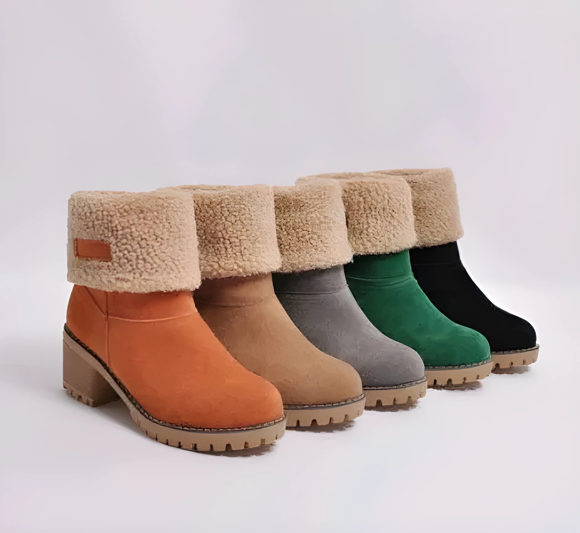 Women's mid-calf suede snow boots in black with a thick low heel and waterproof platform.