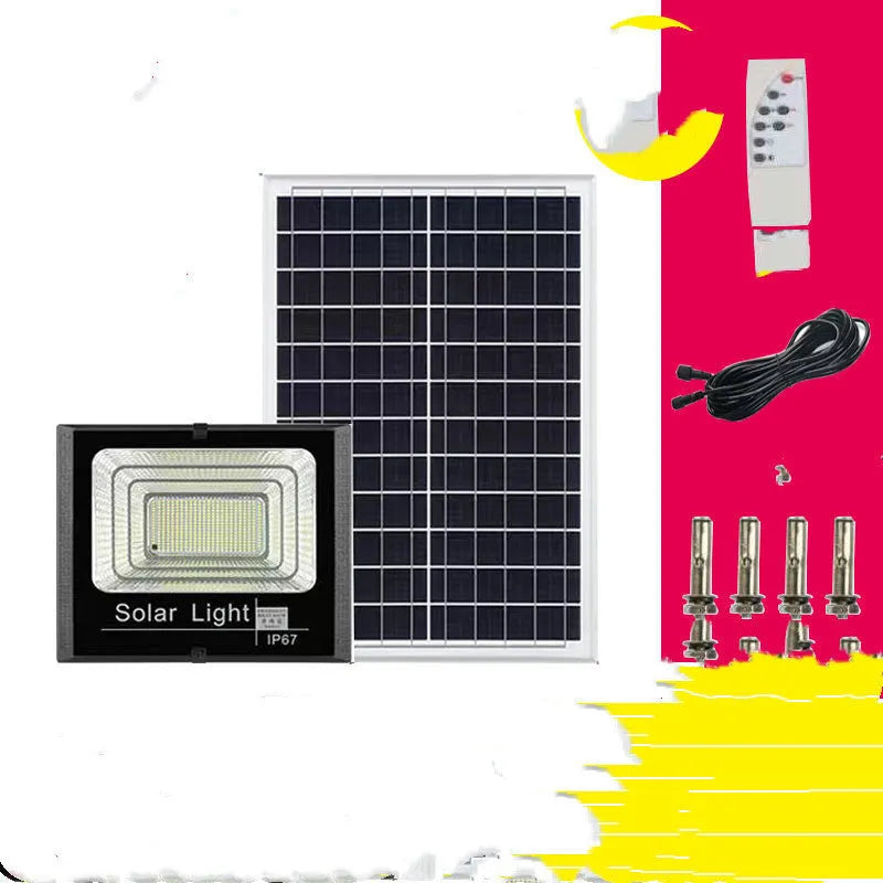 Black solar-powered outdoor LED flood light with remote control on a garden wall.