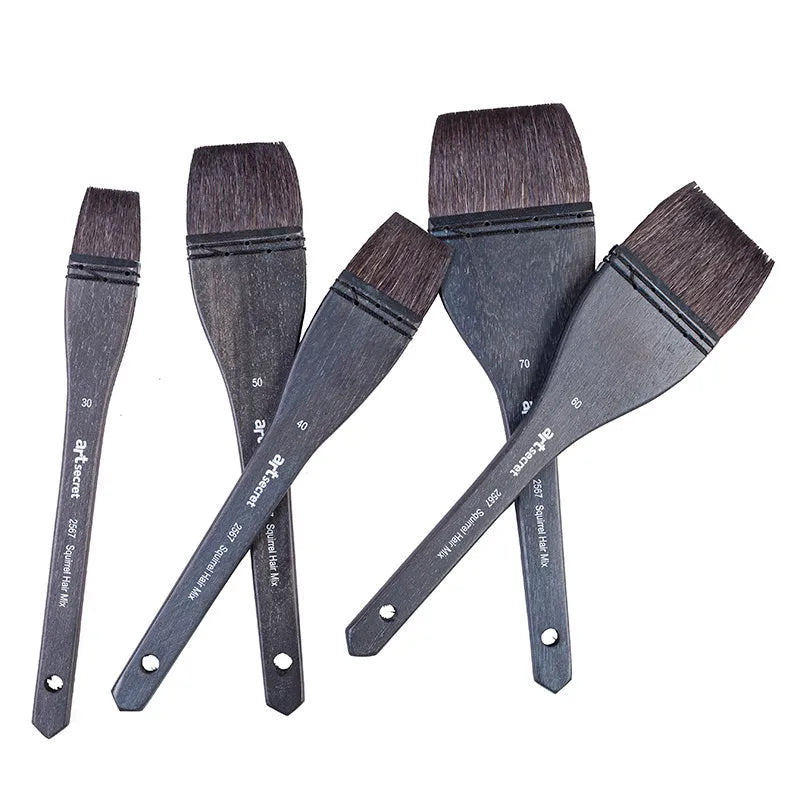 Grey squirrel hair artist paint brush with a light wood handle on a white background