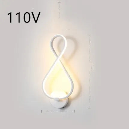 Minimalist Nordic design LED wall lamp with a silicone shade, mounted on a bedroom wall.