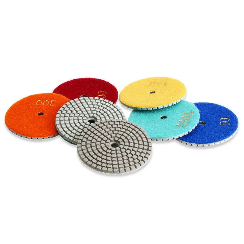 Set of 10 stone polishing pads with diamond emery abrasive, ranging from 50 to 3000 grit.
