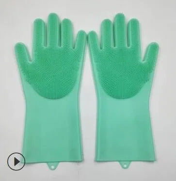 Blue silicone cleaning gloves with a textured sponge palm design for scrubbing.