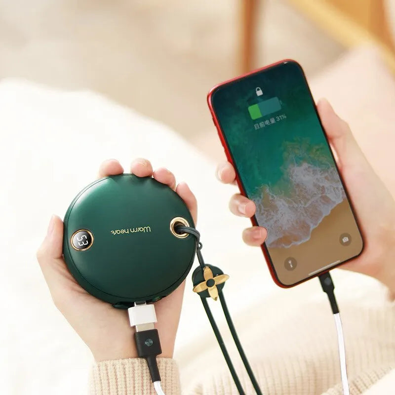 Green, pink or white 5000mAh power bank with digital display and integrated hand warmer function.