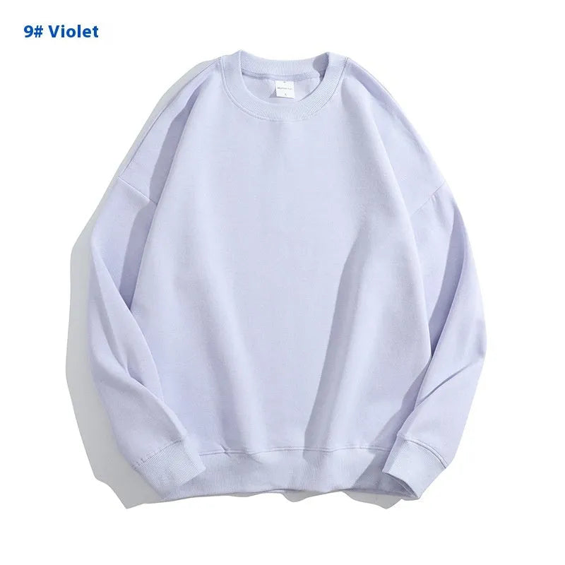 Cotton off shoulder pullover sweater in a loose fit, shown in a solid colour with long sleeves.