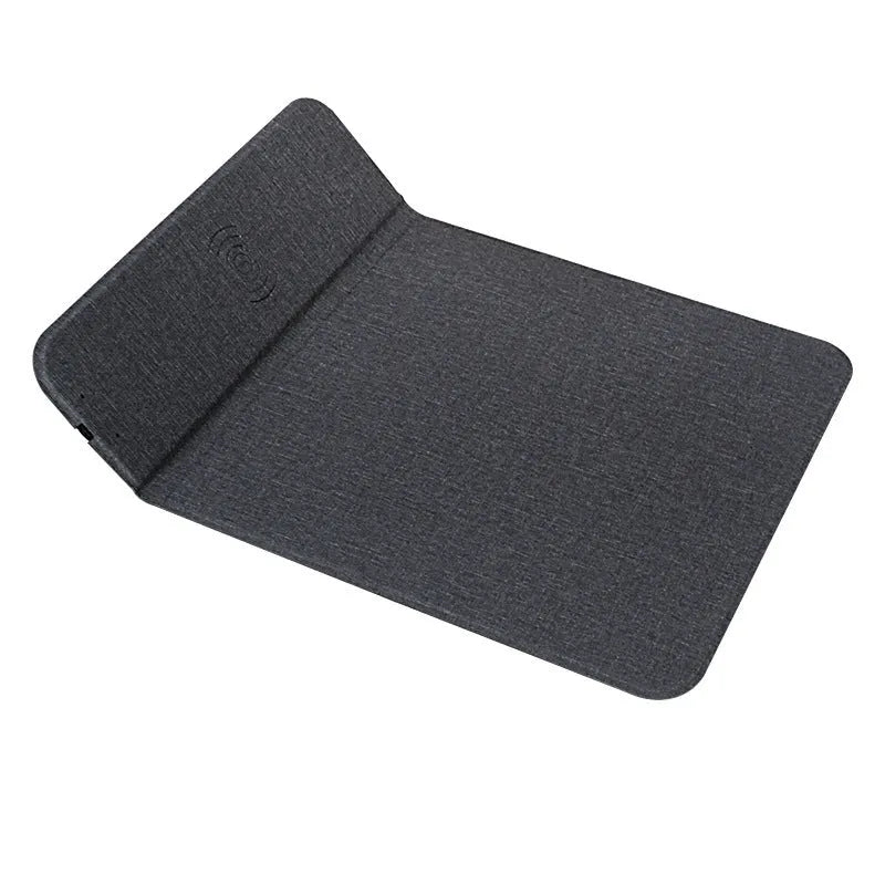 Black foldable cloth phone holder open and showing wireless charging pad.