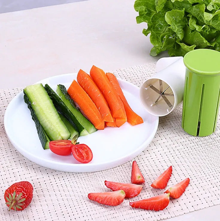 White vegetable cutter with six stainless steel blades for slicing cucumbers, carrots and strawberries