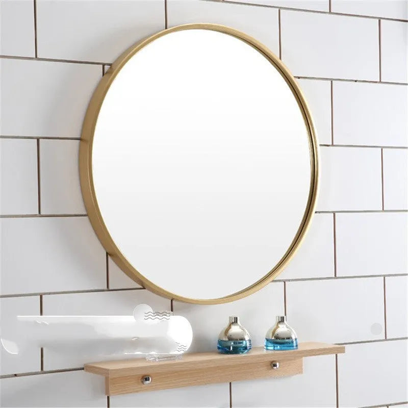 Round metal frame bathroom wall mirror in black finish showing 30cm diameter