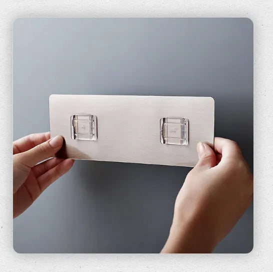 White plastic wall-mounted kitchen knife rack for utensil storage