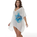 White plus size loose fit beach cover-up blouse for women.