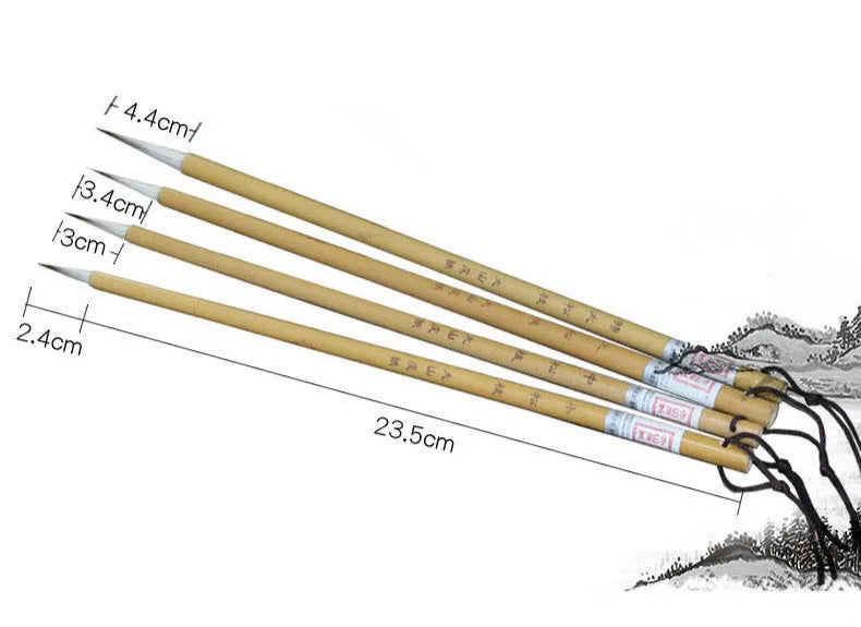 Set of four gold-coloured calligraphy brushes with wolf wool thread and mixed hair tips.