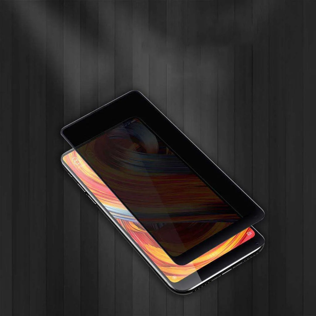 Black ceramic matte anti-peep screen protector for iPhone on a phone screen.