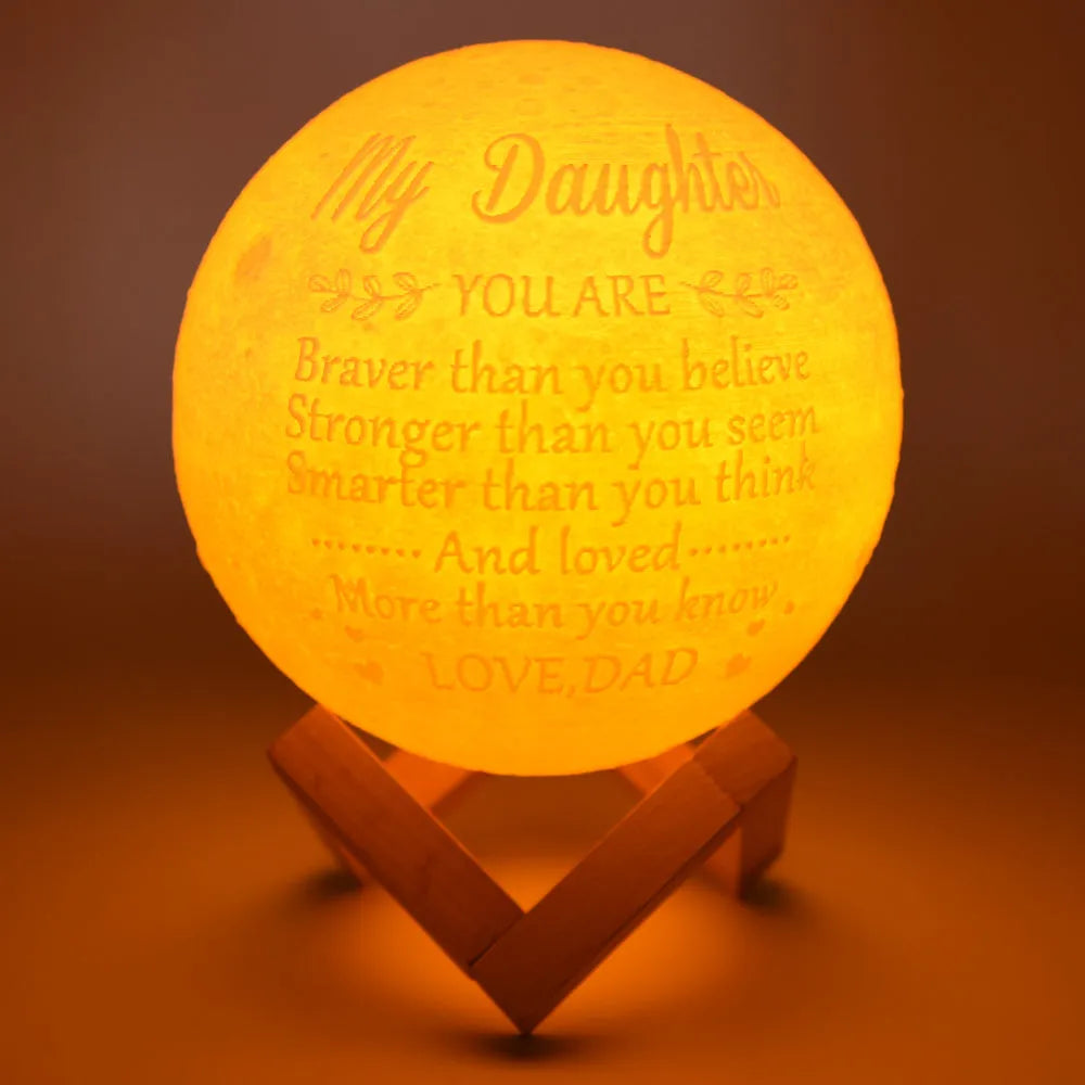 15cm 3-colour LED moon light with 3D printed plastic shade on a bedside table, touch control at base