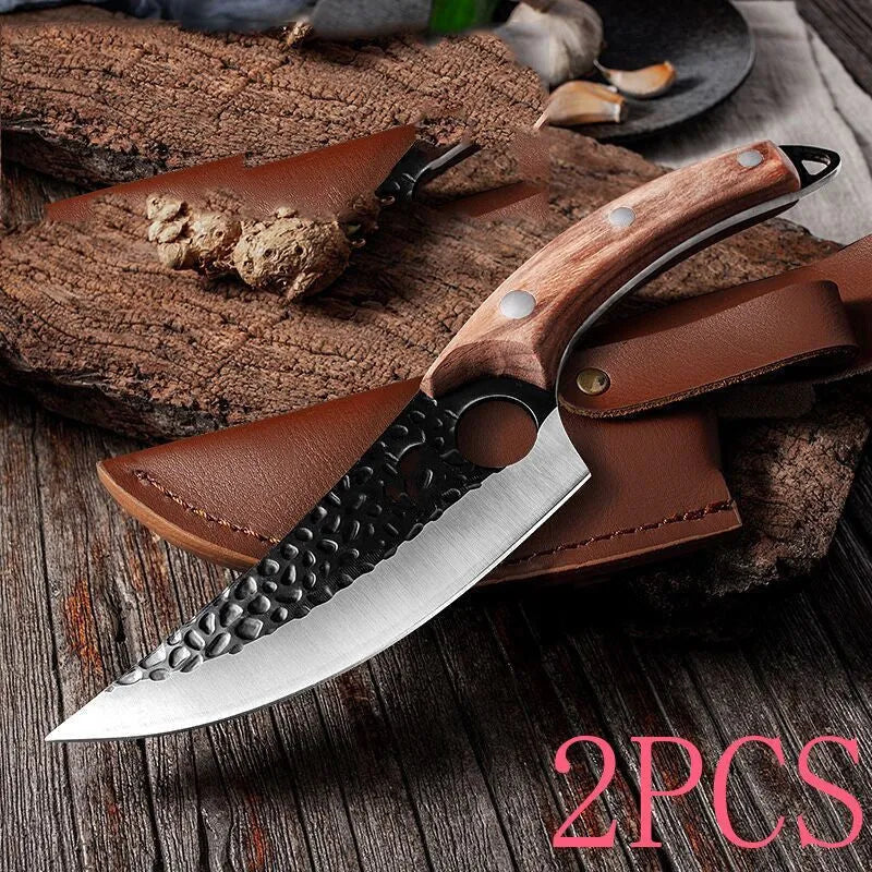 Curved boning butcher knife with hammer-pattern blade and brown leather sheath on a cutting board.