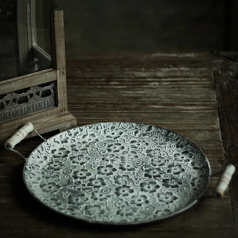 Round wrought iron storage tray in European style, shown in two size options.