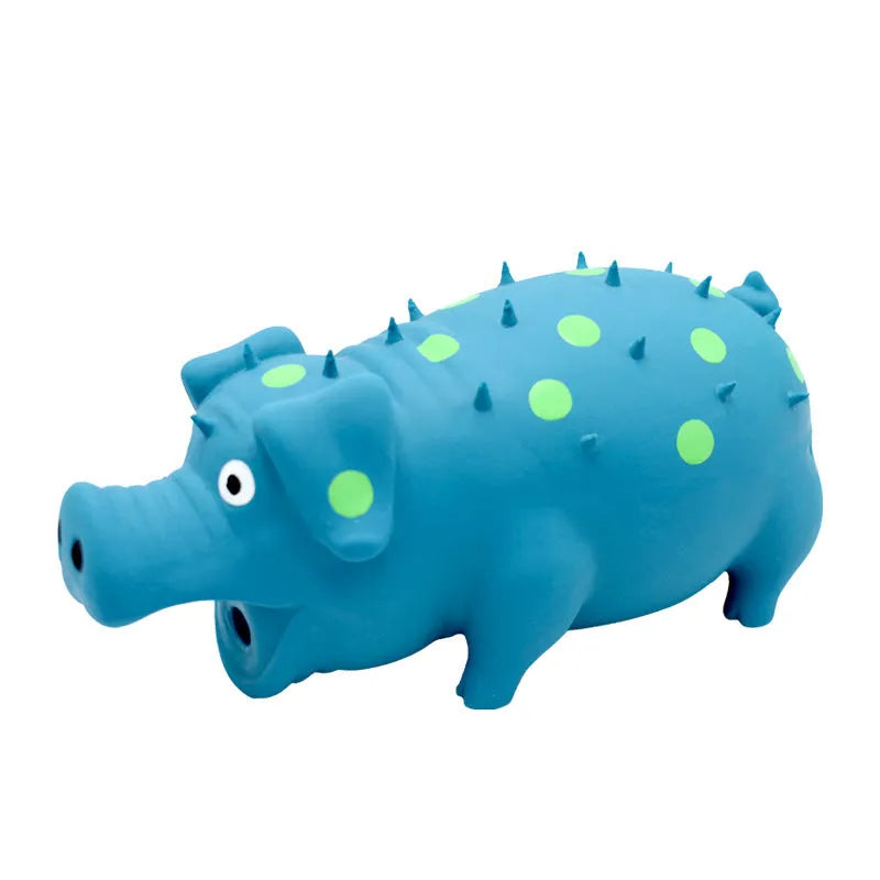 Pig-shaped latex dog chew toy with textured surface and squeaker in various colours