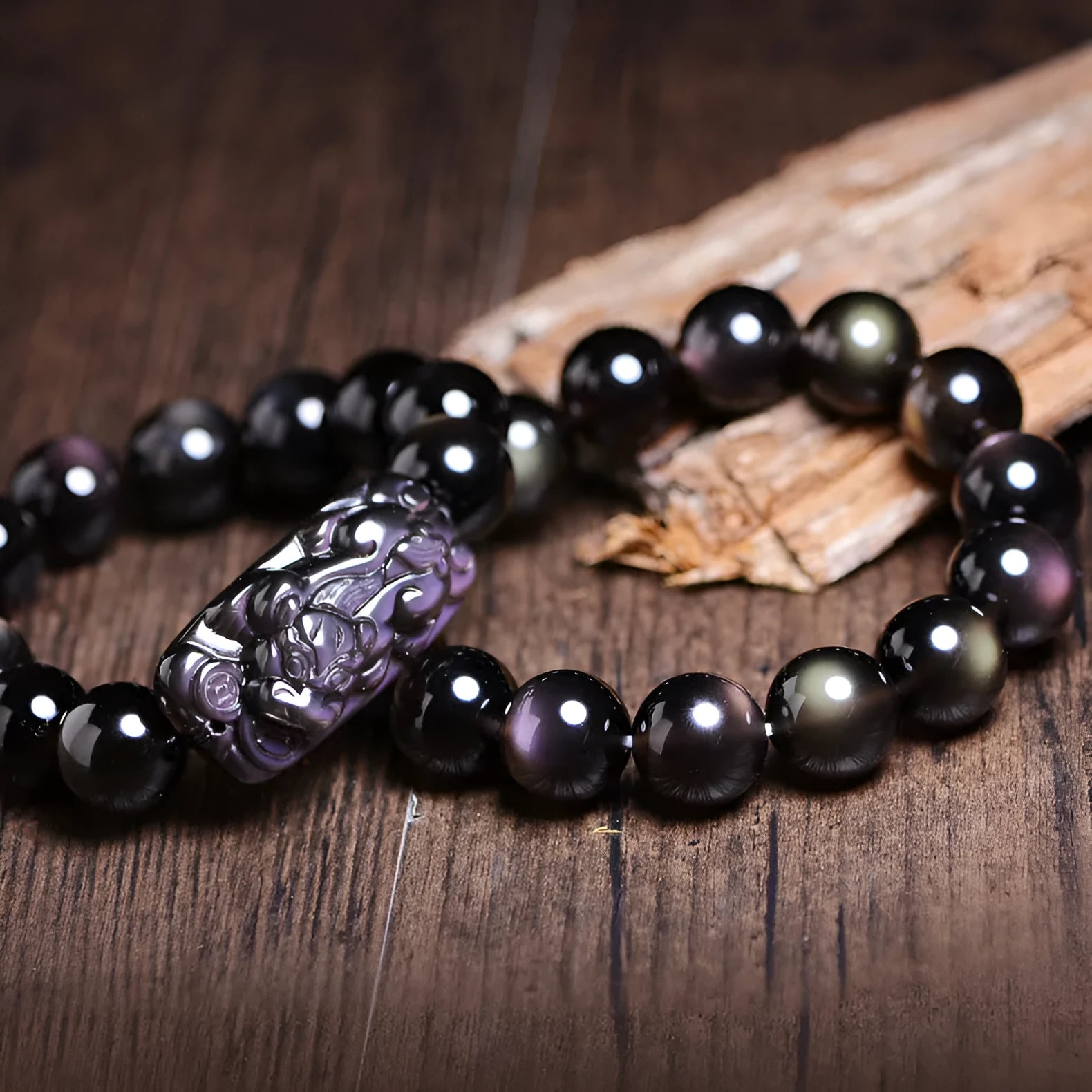 Polished geometric crystal bracelet with ice stone beads in various sizes on wrist