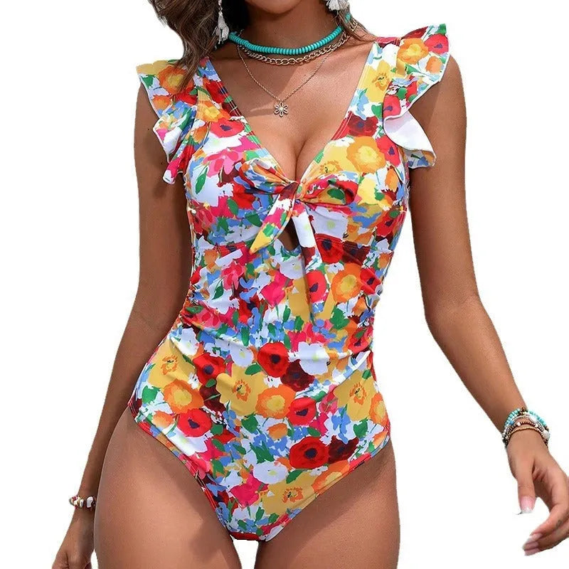 Women's printed one-piece swimsuit with solid colour pattern and conservative cut for swimming and hot springs