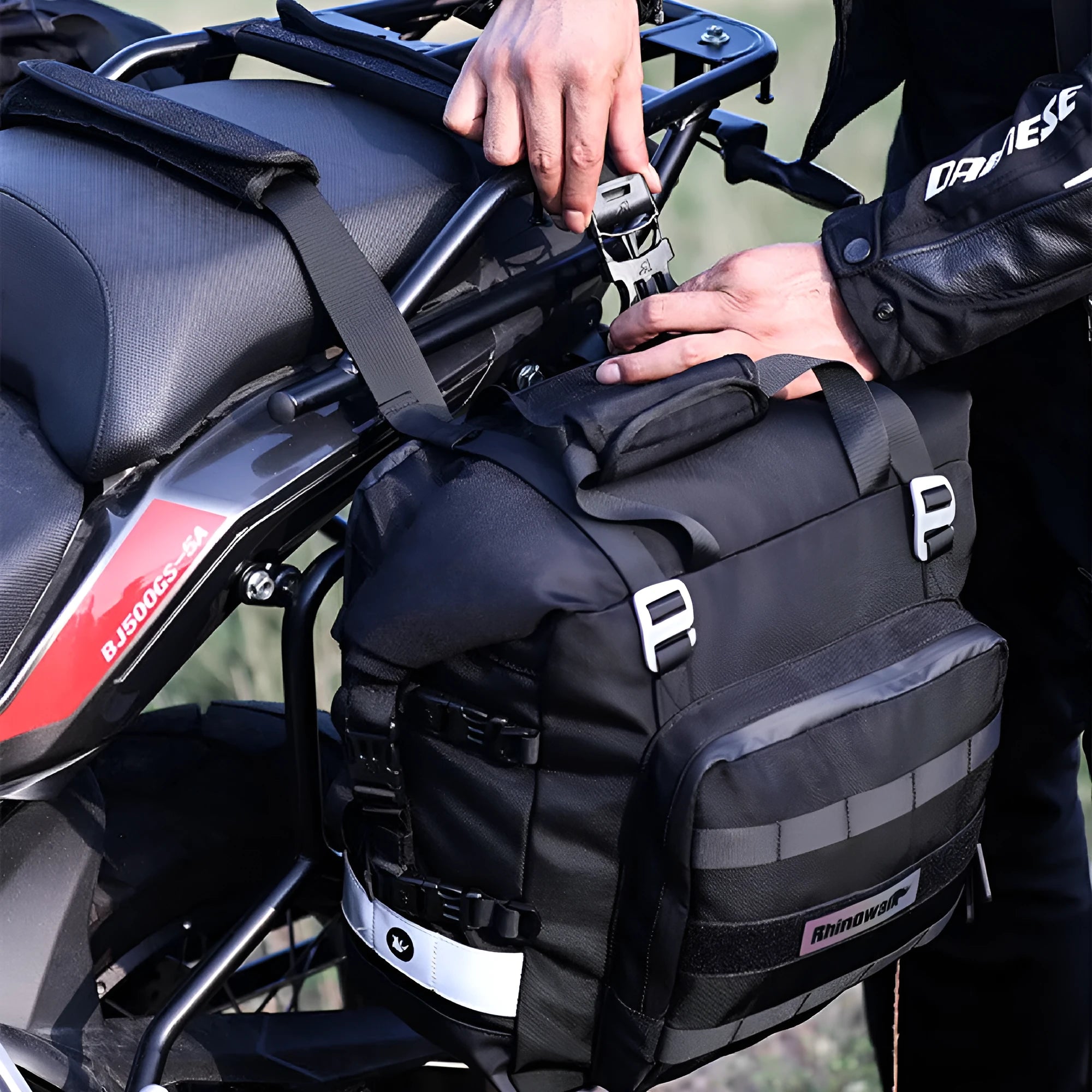 Black 20L quick release motorcycle side bag mounted on a bike.