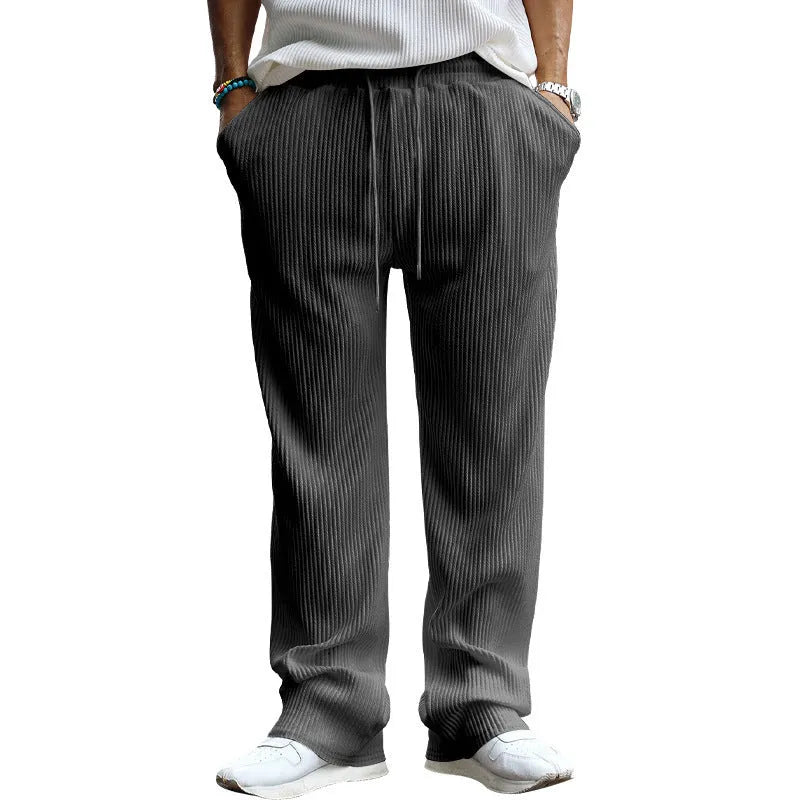 Men's casual high-waist straight-leg trousers in Army Green showing loose fit and striped design