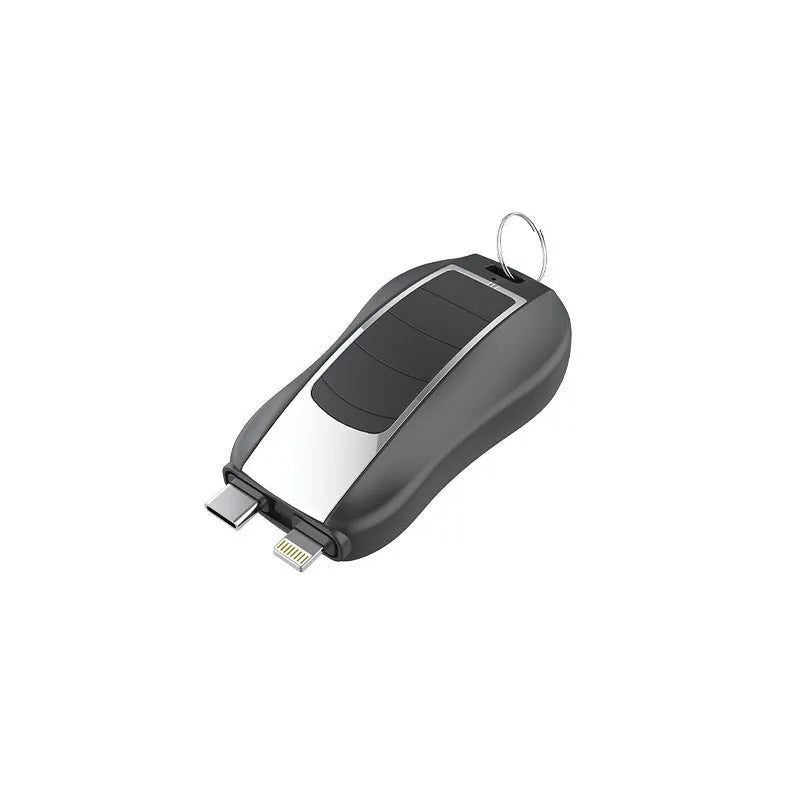 Mini plastic keychain power bank with 1500mAh capacity on a keyring.