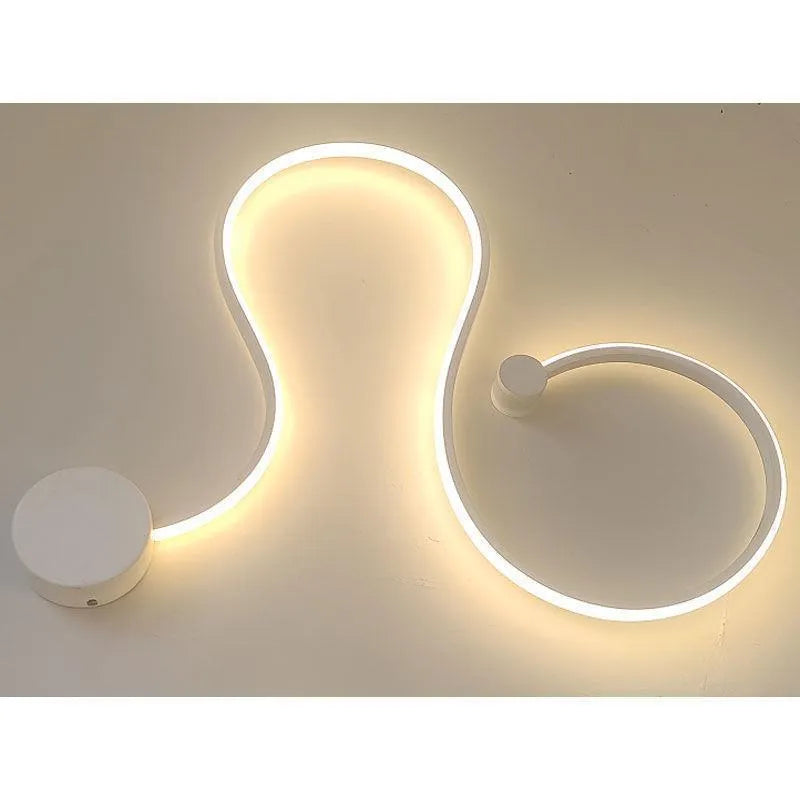 Modern LED wall lamp with aluminium shade in black finish, wall-mounted design for bedroom or corridor lighting