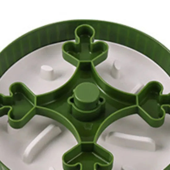 Slow feeder dog bowl with rotating game board and textured silicone licking mat insert.