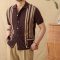 Cotton striped short sleeve knitted cardigan polo shirt on a hanger showing lapel collar.
