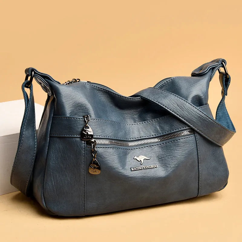 Single-shoulder women's bag in PU with soft build, urban minimalist style, shown in black, yellow, gray, red, green, blue, or purple