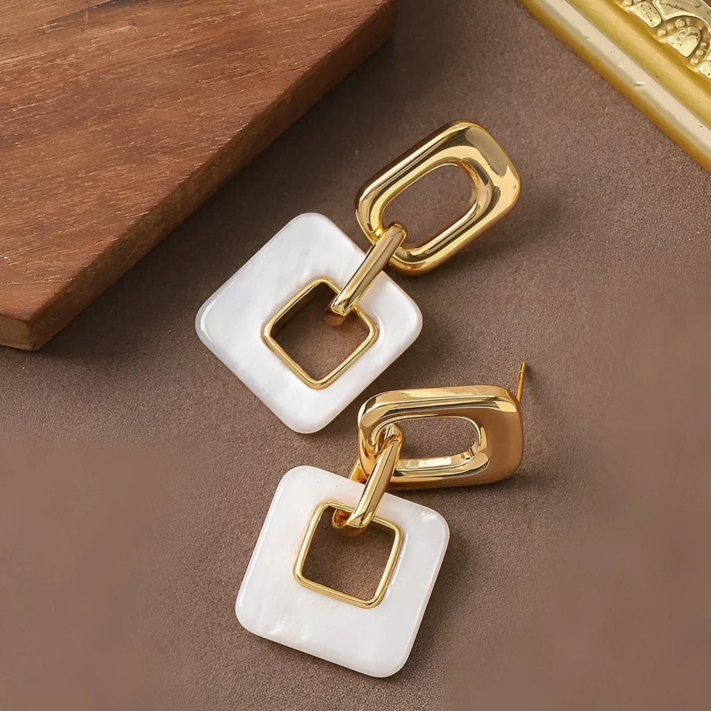 Hollow geometric square earrings with chamfered pattern in electroplated copper