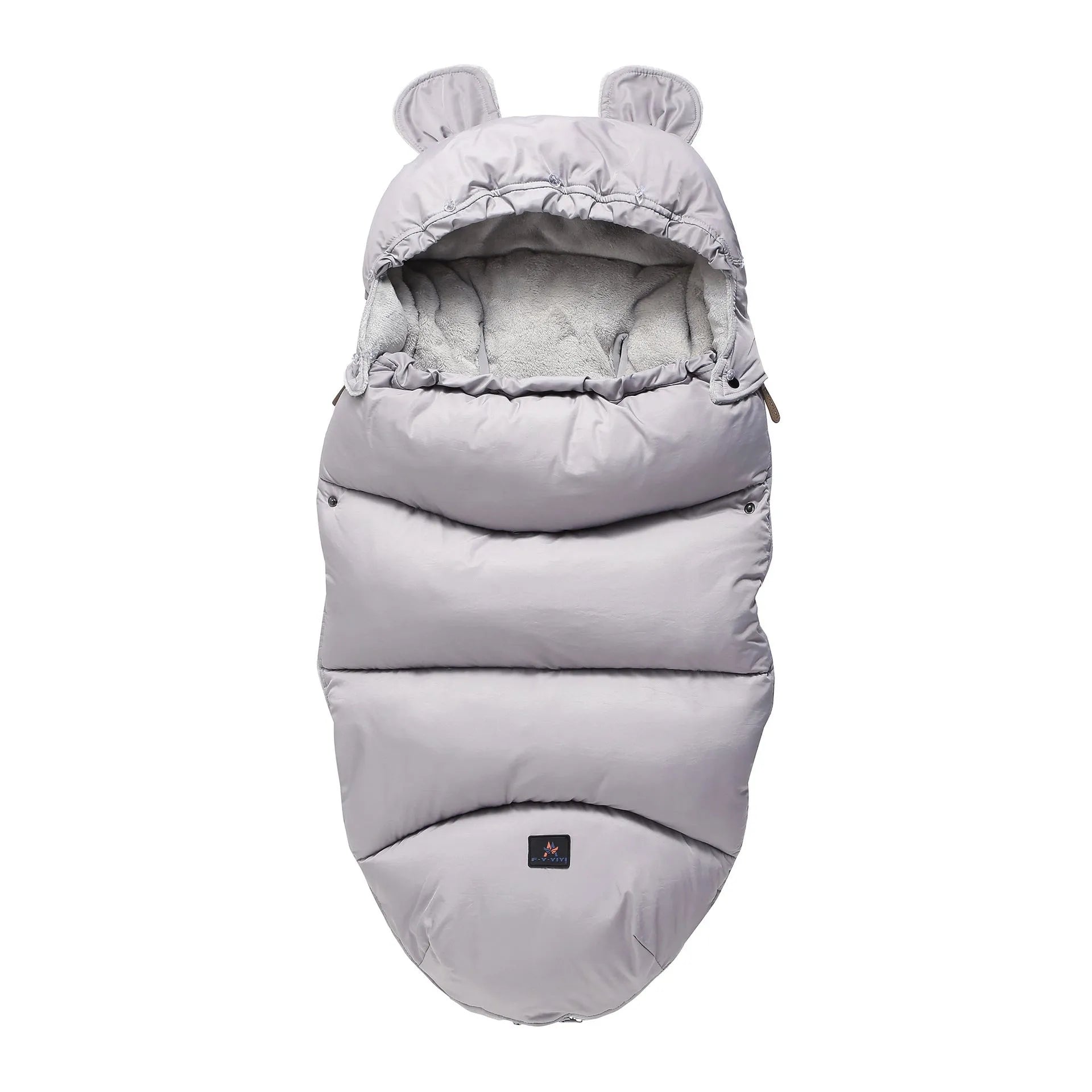 Convertible baby sleeping bag cocoon in a pram, showing cotton blend fabric and flannel lining.
