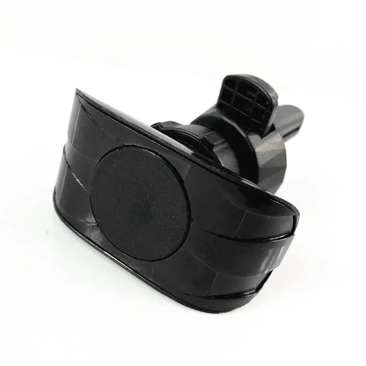 Black car phone holder mounted on vehicle air vent with phone in cradle