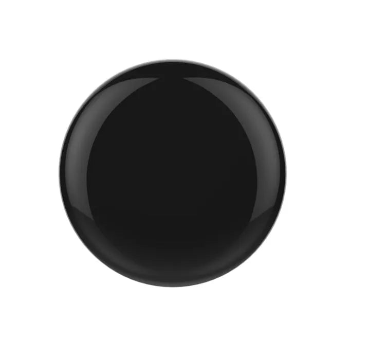 Black compact WiFi infrared universal remote control on a table, 67x67x19.5 mm, with 360° multi-directional IR