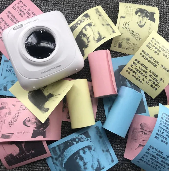 Mini Bluetooth wireless thermal printer in white, pink, and blue, compact 79x42x79mm size
