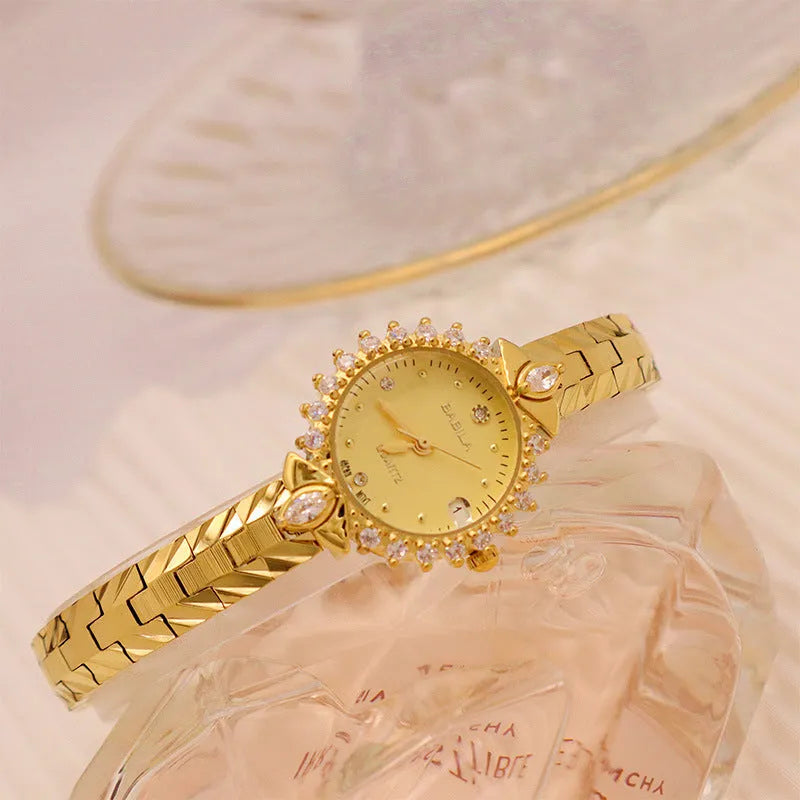 Women's quartz watch with diamond embossed bracelet in gold colour