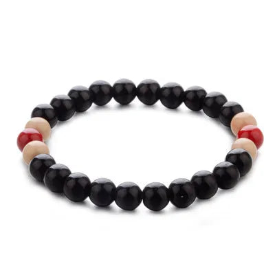 Natural stone bead bracelet with lava stones on a wrist