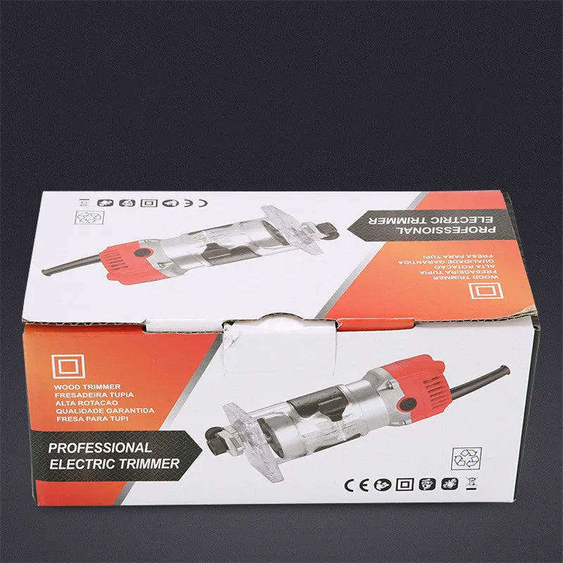 800W electric wood polishing trimmer with silver aluminium casing and a black handle on a workbench.